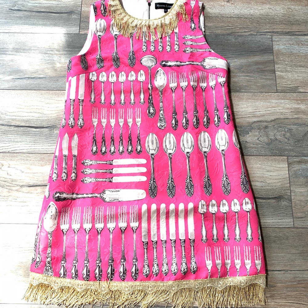 Pink forks dress with gold fringe!